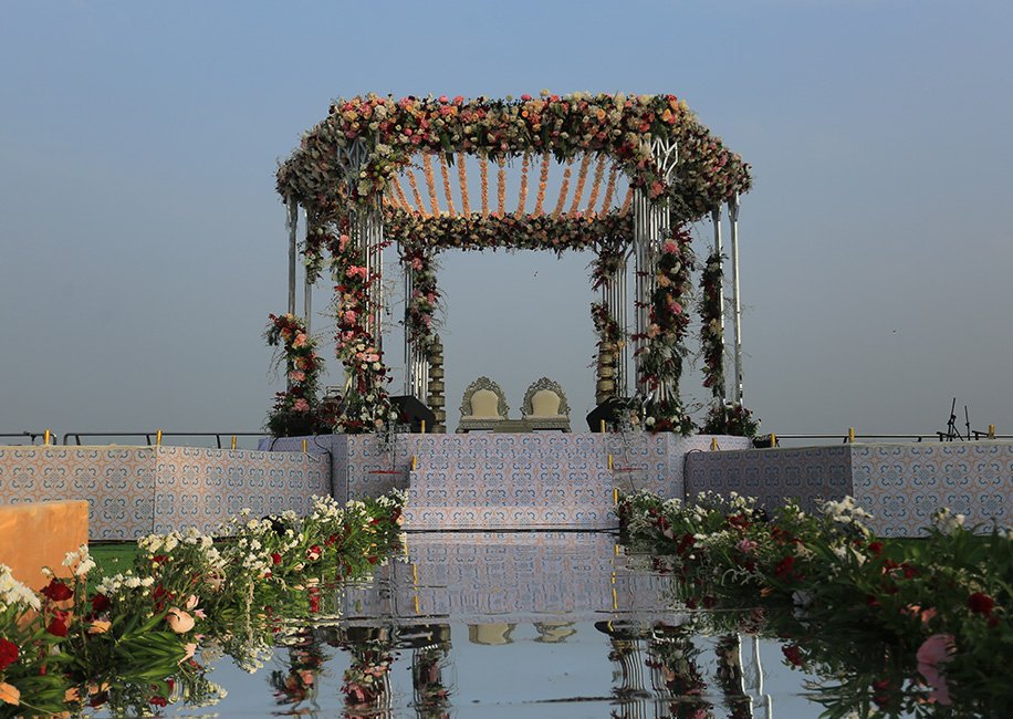 A glamorous cocktail party to an open-air floral wedding mandap