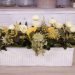 Elongated Floristry Design for a Wedding Table