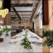 Whimsical wedding DIY's || Greenery chandelier & pressed flower table signs