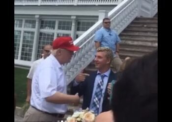 Trump greets wedding party at his golf course