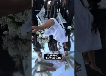 Flipping flower girl gets the marriage party began