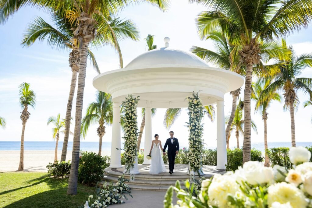 Couple exchanging vows in the oceanfront wedding gazebo at Hyatt Ziva Los Cabos