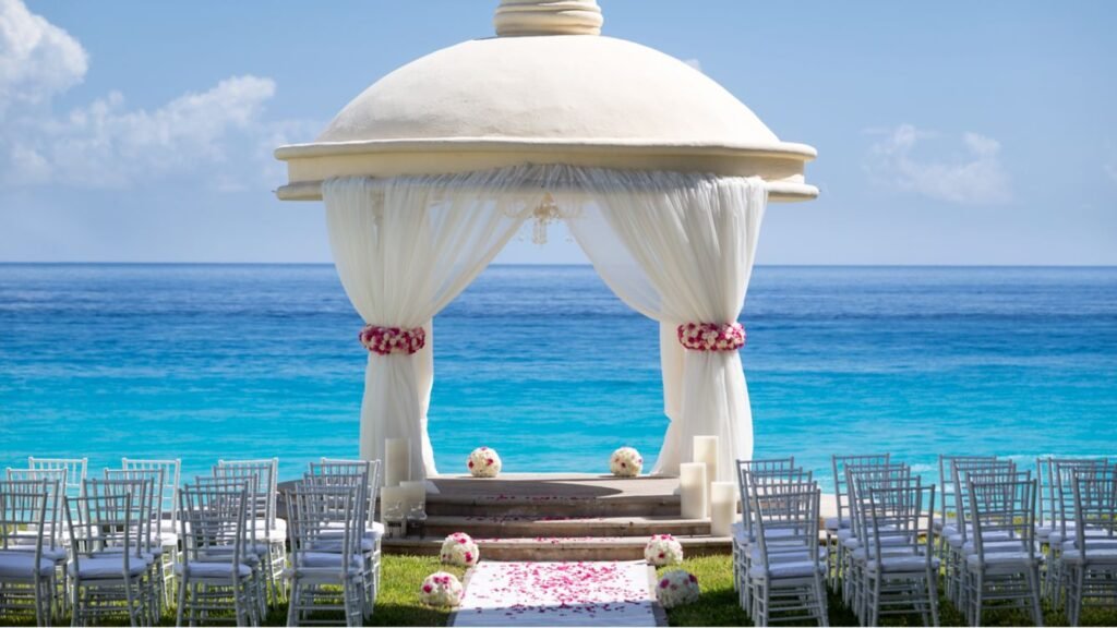 Oceanfront wedding setup at an all-inclusive Cancun resort