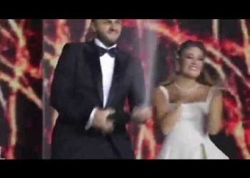 A marriage inside an oval shaped space full of flowers !