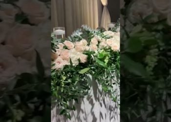 Fresh roses and eucalyptus garland head table decoration