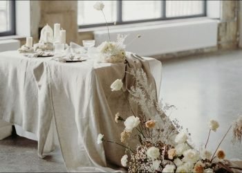 Thing Stories. Natural linen tablecloth decorating wedding table