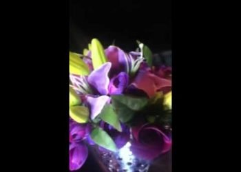 Purple lily, Rose and crocus wedding table centerpiece