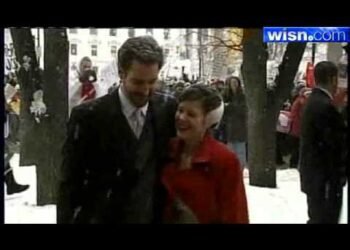 Wedding Party Joins Protesters In Madison