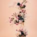 Cascading pink and blue floral wedding arrangement in a pastel garden setting