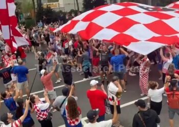Croatia fans marching through Philadelphia crash wedding party
