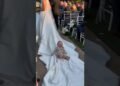 Baby takes a ride on the bride's dress! π€£ Best wedding moment! π°ββοΈ #funnykids #wedding #shorts