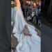 Baby takes a ride on the bride's dress! 🤣 Best wedding moment! 👰‍♀️ #funnykids #wedding #shorts